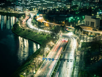 High angle view of light trails on road in city