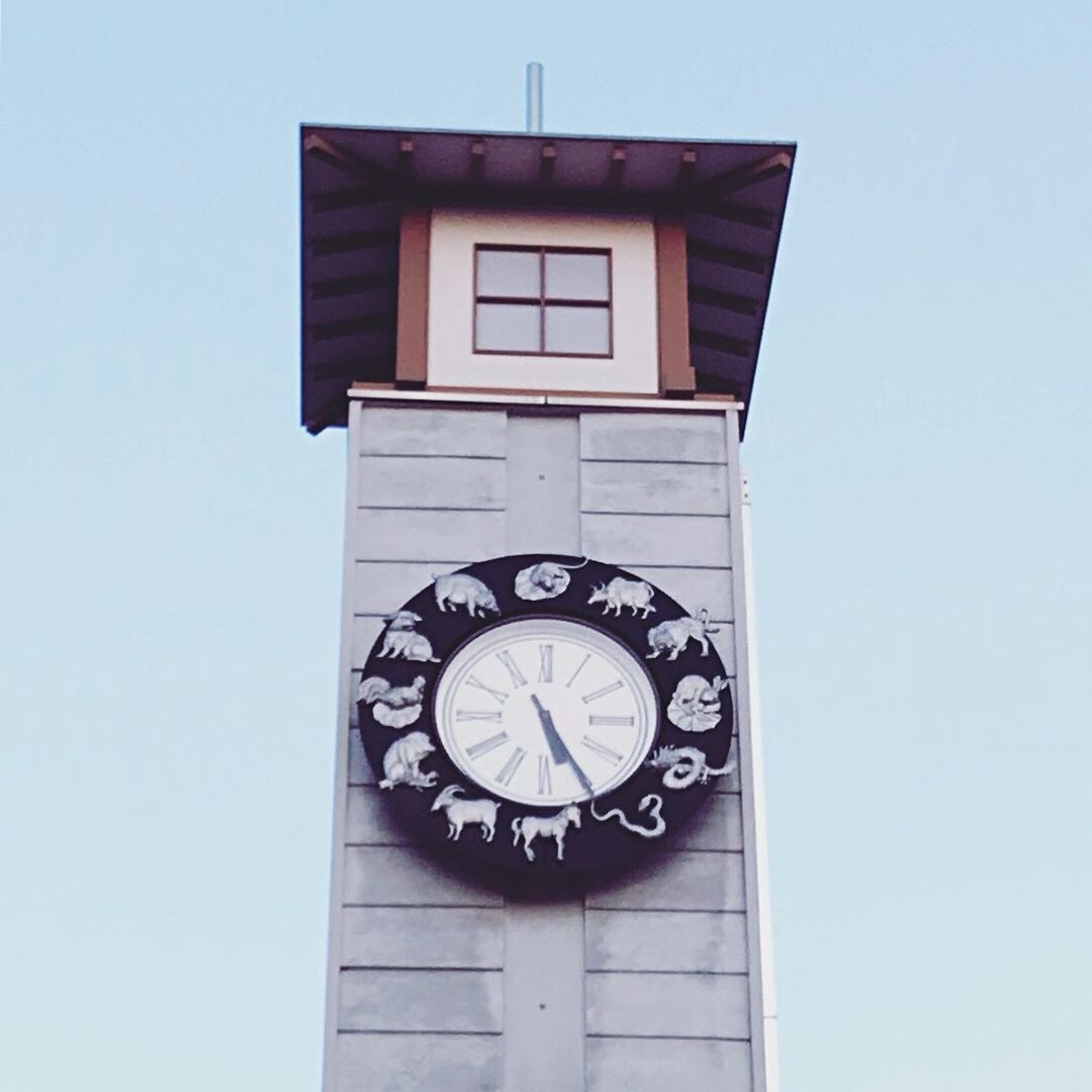 time, clock, low angle view, built structure, architecture, no people, minute hand, building exterior, number, building, clock face, accuracy, clock tower, day, sky, tower, clock hand, wall - building feature, hour hand, instrument of time, wall clock