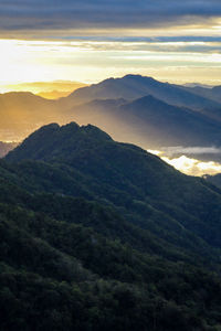 Scenic view of mountains against sky during sunset