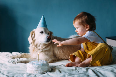 Boy and dog at home