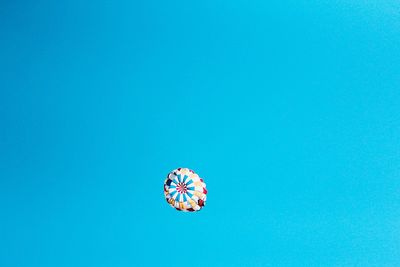 Low angle view of multi colored balloons