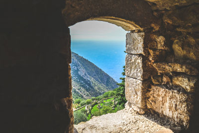 Scenic view of sea seen through window