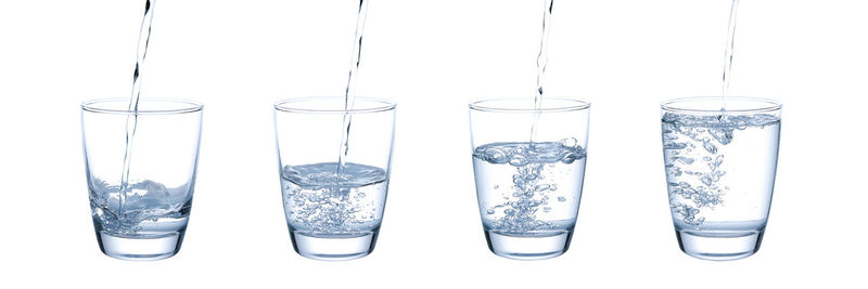 Close-up of wine glass against white background