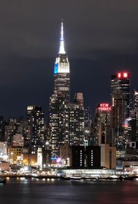 Illuminated buildings in city at night