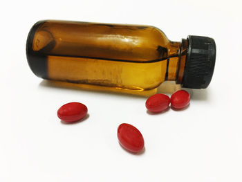 Close-up of red wine against white background