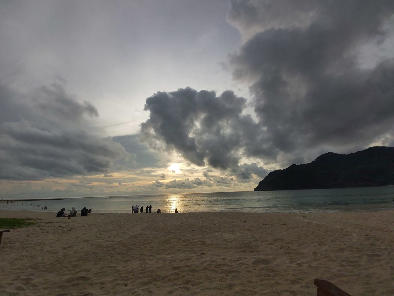 SCENIC VIEW OF BEACH DURING SUNSET