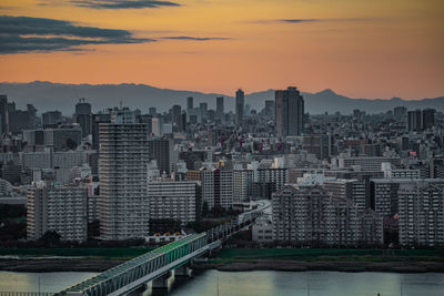 High angle view of cityscape against sky during sunset