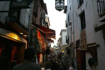 People walking on street in city