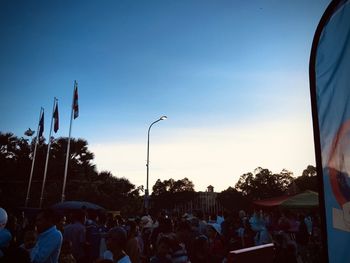 People on street in city at dusk