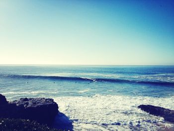 Scenic view of sea against clear sky