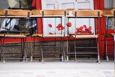 Empty chairs and tables in cafe