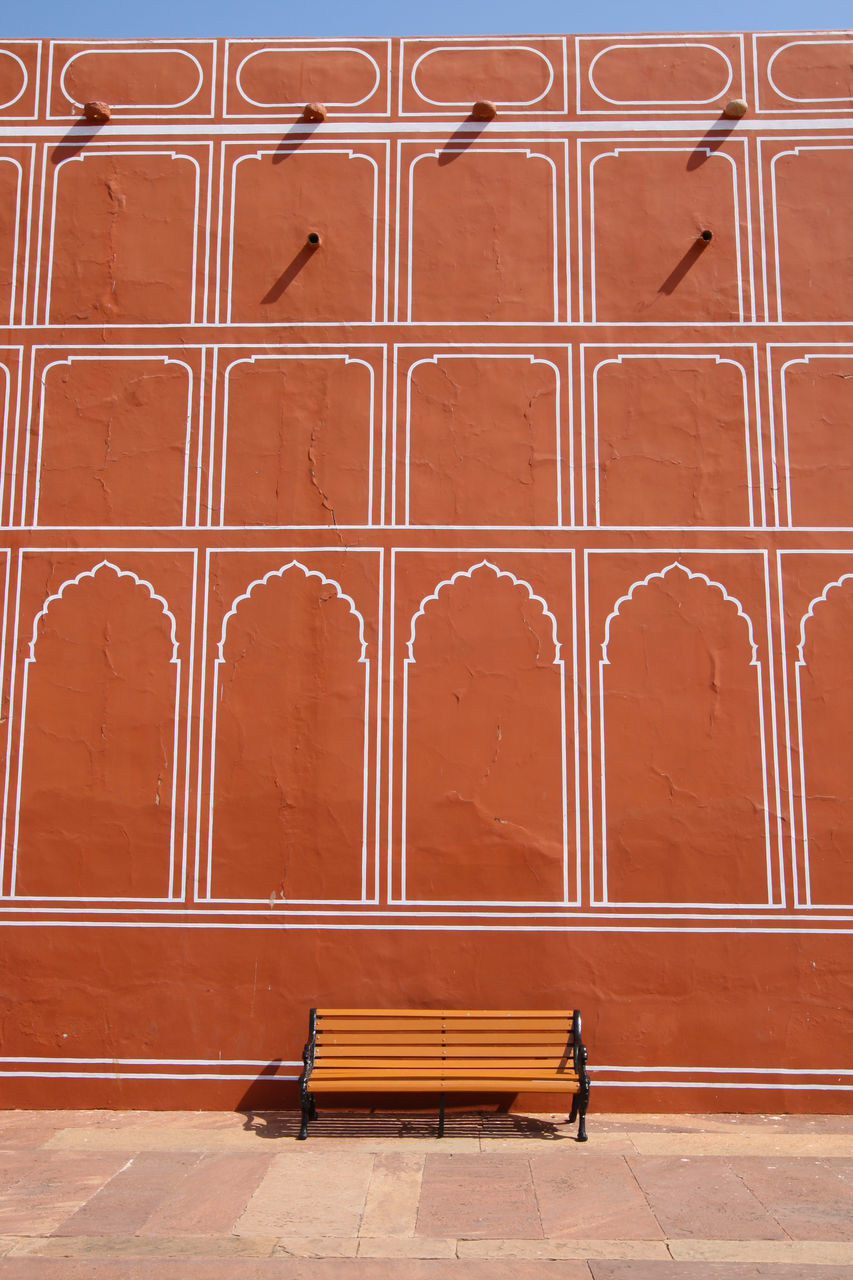 HIGH ANGLE VIEW OF FOOTPATH BY BUILDING