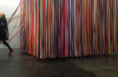 Close-up of man standing on table