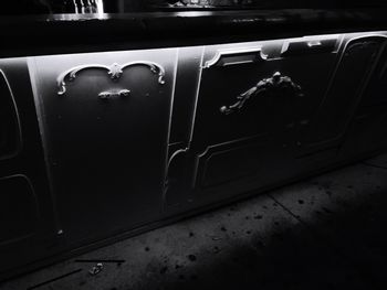 Close-up of car on road