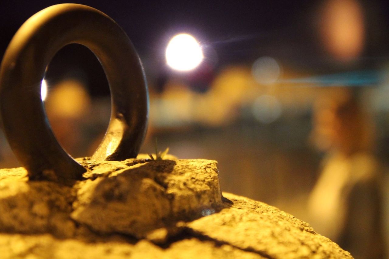 focus on foreground, close-up, selective focus, metal, circle, sunlight, rusty, textured, sunset, outdoors, no people, metallic, built structure, pattern, nature, old, sky, detail, day, weathered