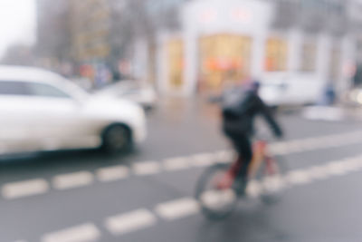 Close-up of blurred motion of car on street