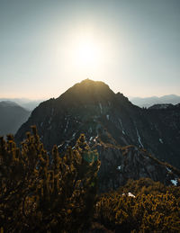 Scenic view of mountains against sky during sunset