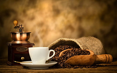 Close-up of coffee cup on table