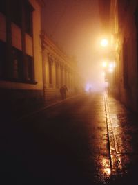 Illuminated street light at night