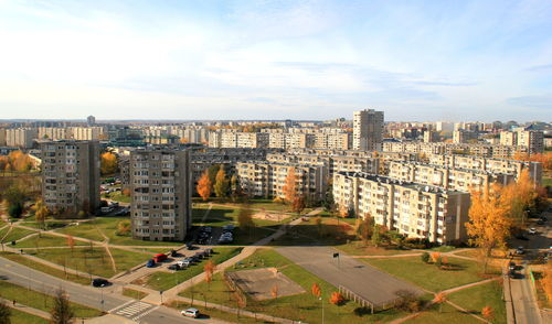 High angle view of buildings in city against sky