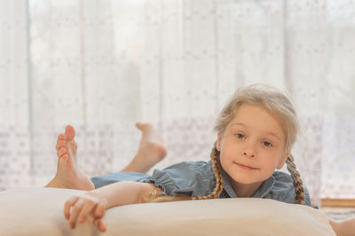 Portrait of cute smiling girl at home