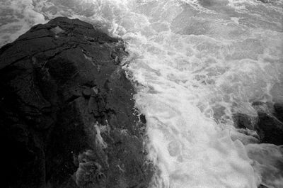 Close-up of water flowing through rocks