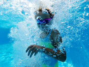 Portrait of girl in swimming pool