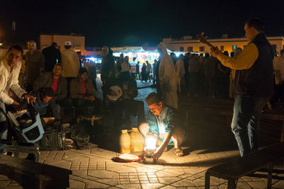 Group of people working at night