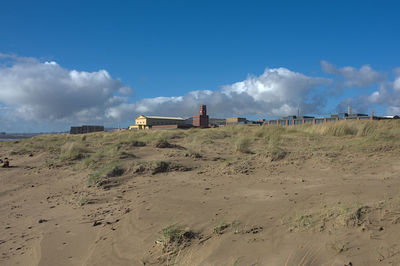 Panoramic view of beach against sky