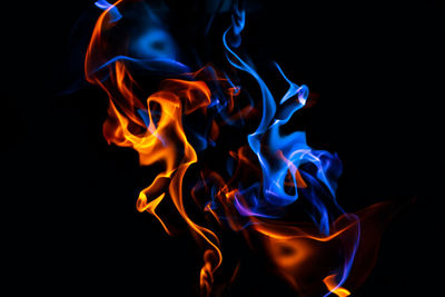 Close-up of fire against black background