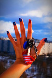 Close-up of hand holding key