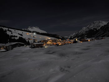 Scenic view of beach against sky during winter