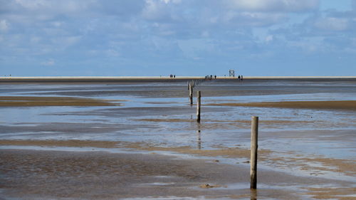 Scenic view of beach against sky