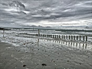 Scenic view of beach against sky