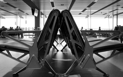 View of an empty chairs and tables at airport