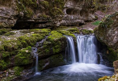 Waterfall falling in forest