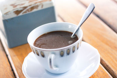 High angle view of coffee cup on table