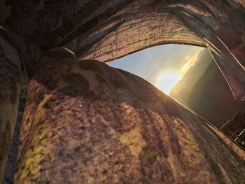 Low angle view of rock against sky