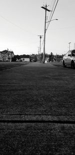 Cars on road against sky