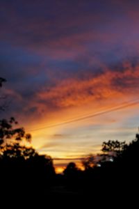 Scenic view of dramatic sky during sunset