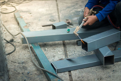 High angle view of man working on table