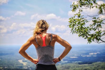 Rear view of woman looking at mountains