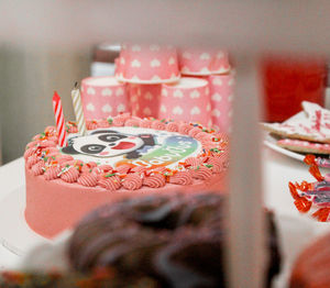 Close-up of hand holding cake