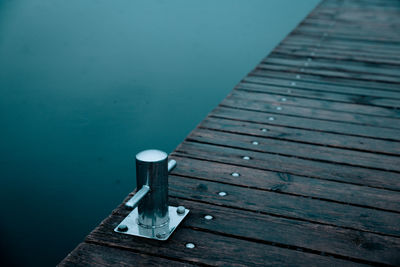 High angle view of cleat on jetty over sea