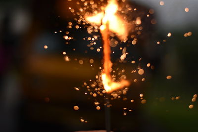 Defocused image of illuminated lights at night