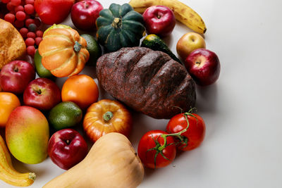 High angle view of tomatoes on white background