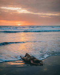 Scenic view of sea against sky during sunset