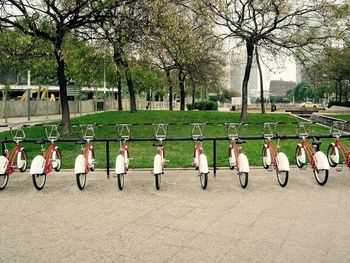 Bicycles parked in rack at park