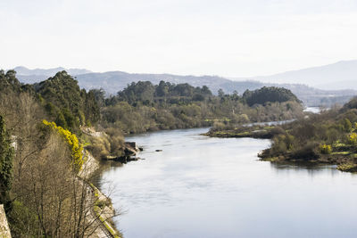 Scenic view of river against sky