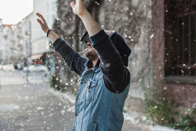 Midsection of man standing in snow